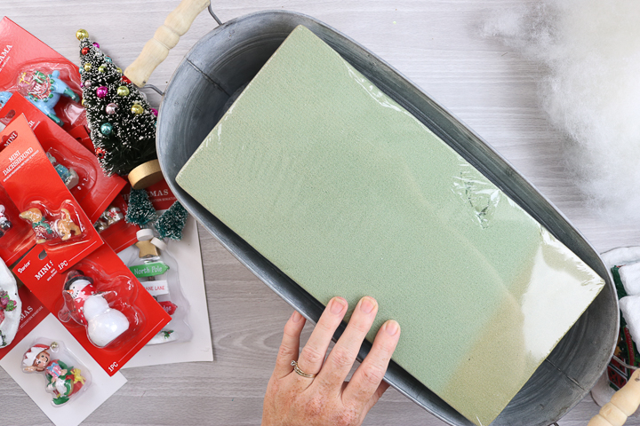 adding foam to galvanized container