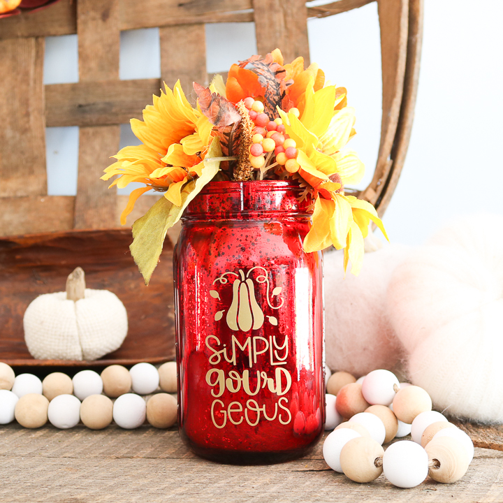 fall-themed mason jar vase with festive florals
