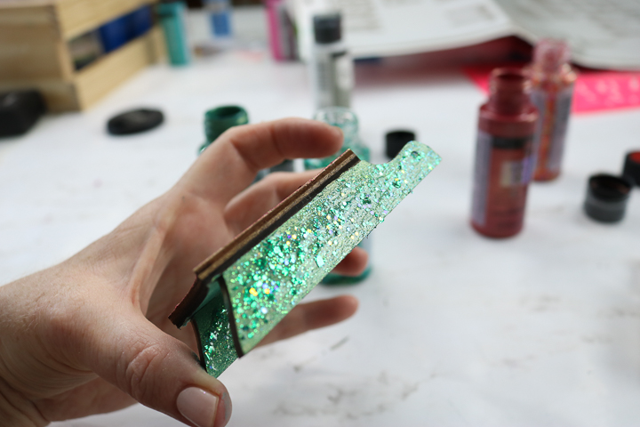 green glitter paint on an ornament