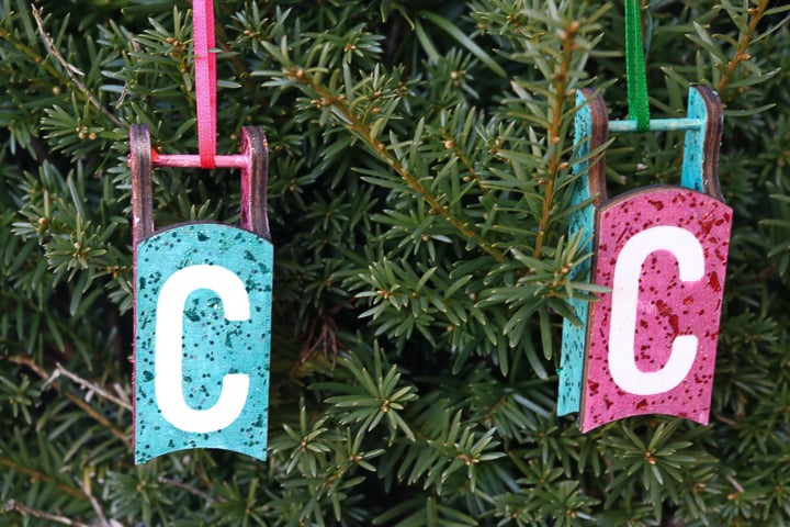 pink and blue glitter ornaments with the letter "c"