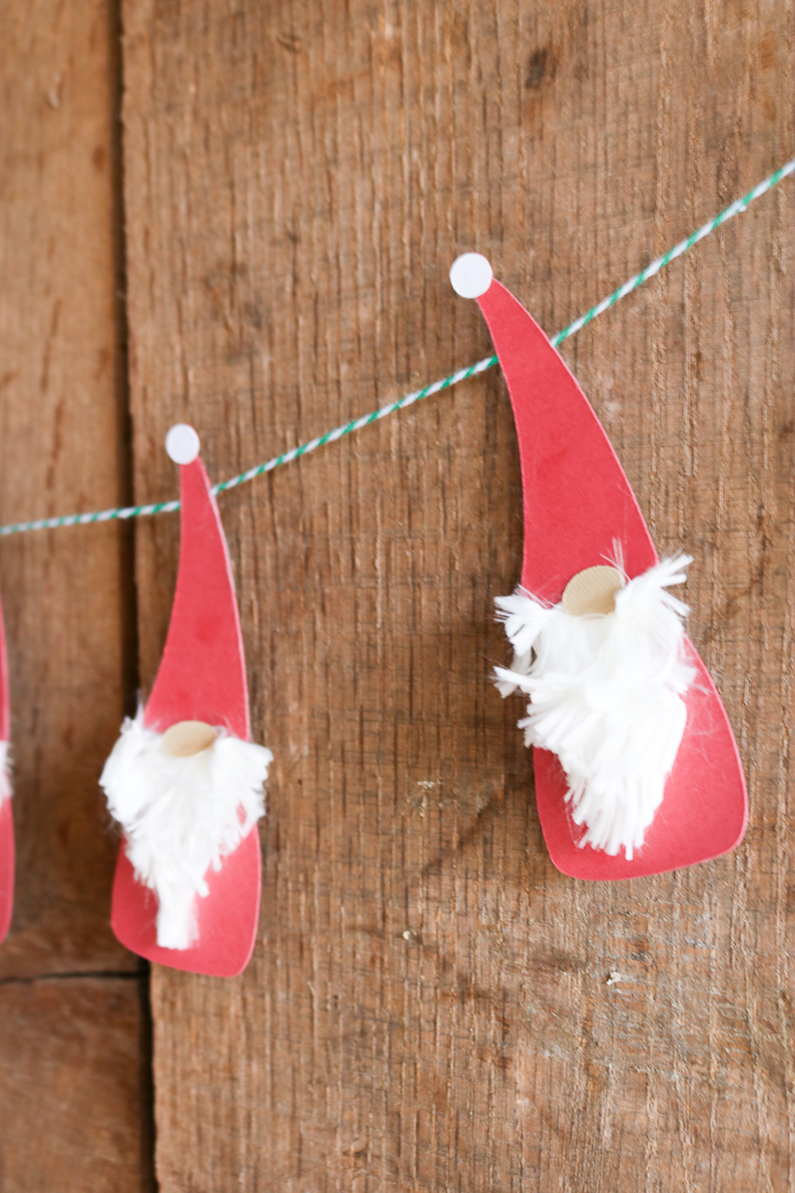 This adorable Christmas gnome banner is a simple DIY cricut project you can make with a free gnome SVG file