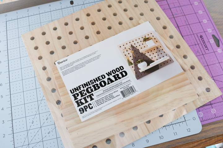 You can use wood pegboard for craft room organization