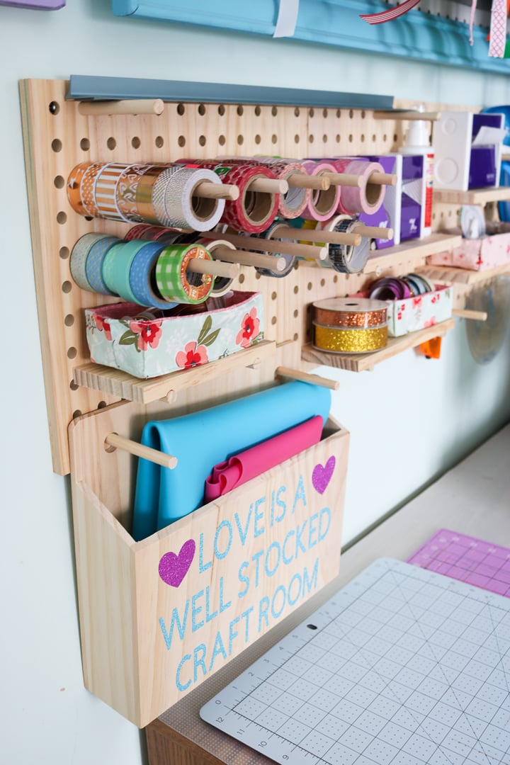 Here's how to organize crafting ribbon using a wood pegboard