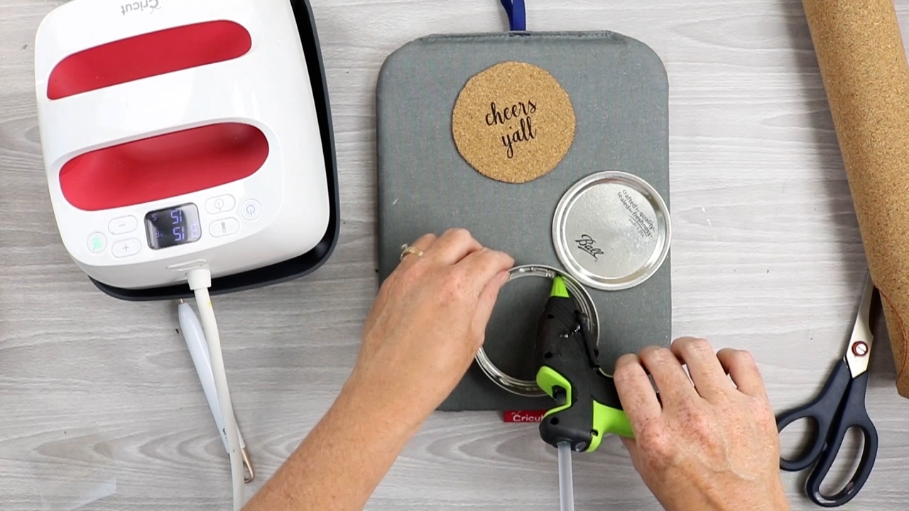 adding glue to mason jar lid