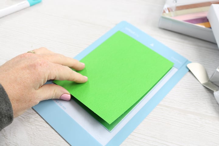 cutting a card on a cricut mat