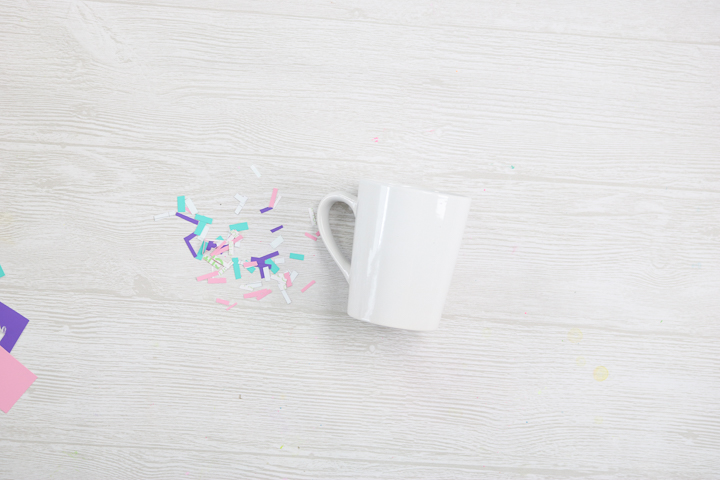 cutting scrap vinyl into confetti