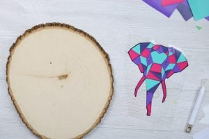 vinyl art to be added to a wood slice