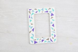 adding vinyl triangles to a picture frame