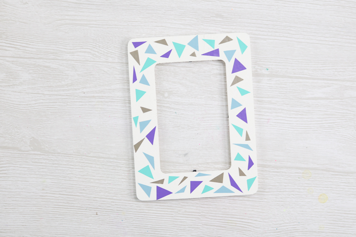 adding vinyl triangles to a picture frame