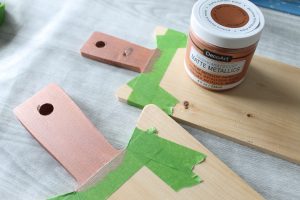 adding paint to a wood cutting board