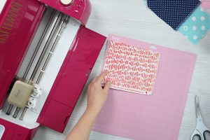 placing fabric on cricut mat