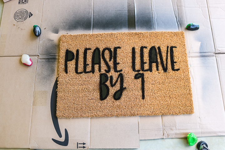 removing a stencil from a doormat