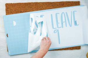 removing a freezer paper stencil from a cricut mat