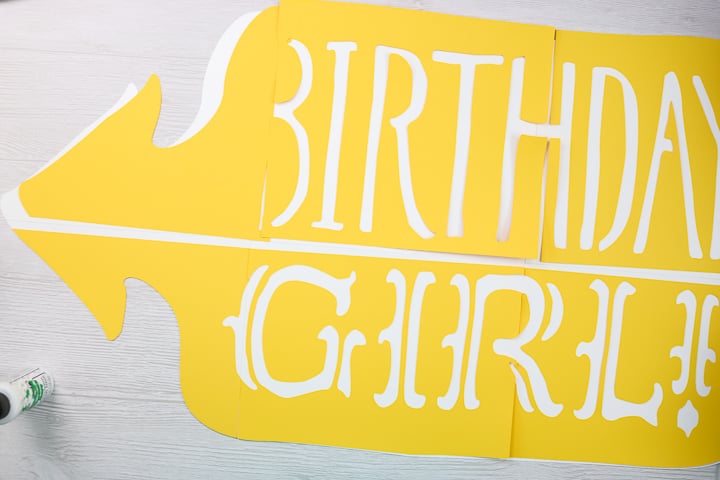 large paper sign on a cricut