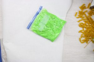 painting pasta using a plastic bag