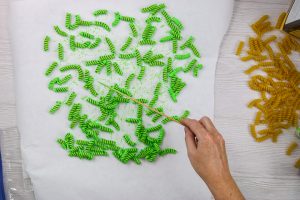 separating pasta for the paint to dry