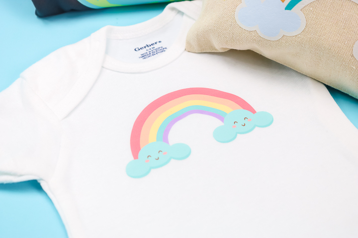 onesie with printed rainbow design