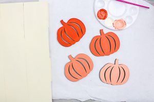 painted pumpkins drying