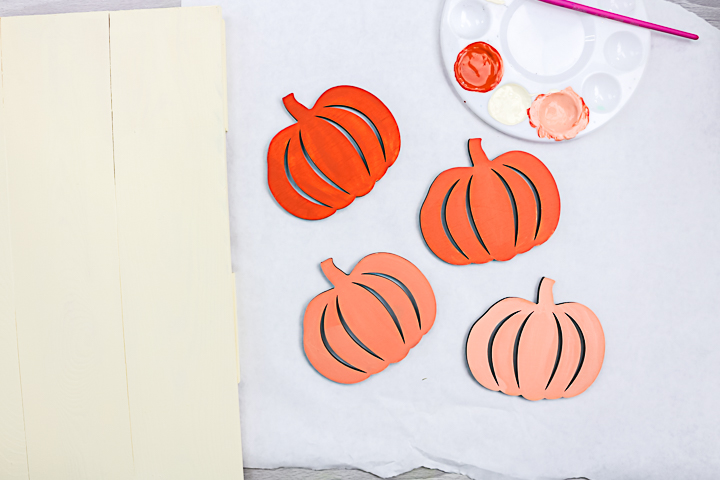 painted pumpkins drying