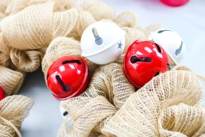 jingle bells on a reindeer wreath