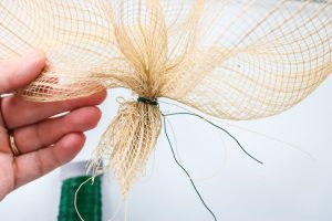 adding deco mesh to a wreath form