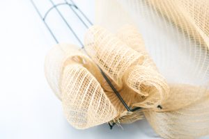 deco mesh on a candy cane wreath form