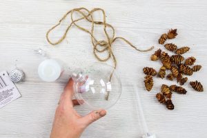 adding glitter inside an ornament