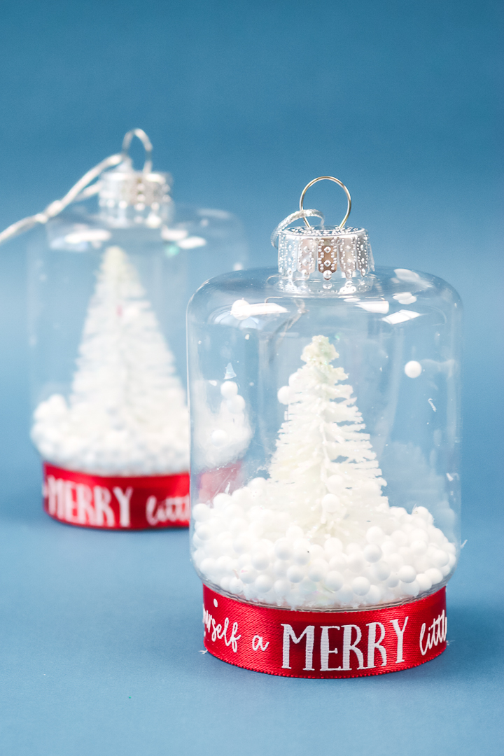 snow globe ornaments with trees