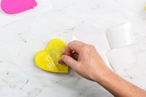white vinyl saying on heart box lid