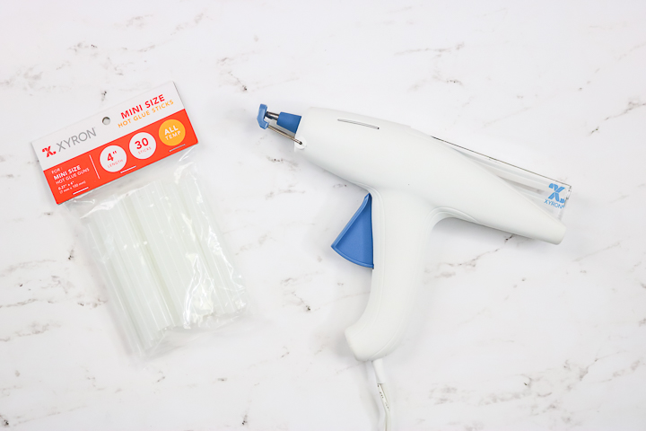 glue gun that holds three sticks