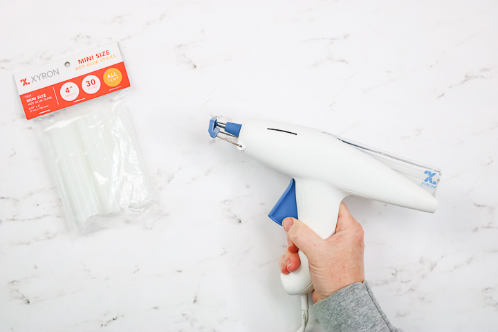 glue gun with drip catcher