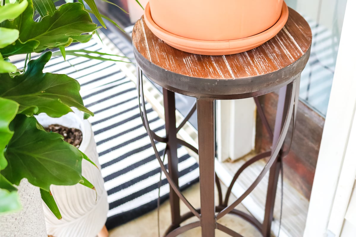 plant stand on a porch