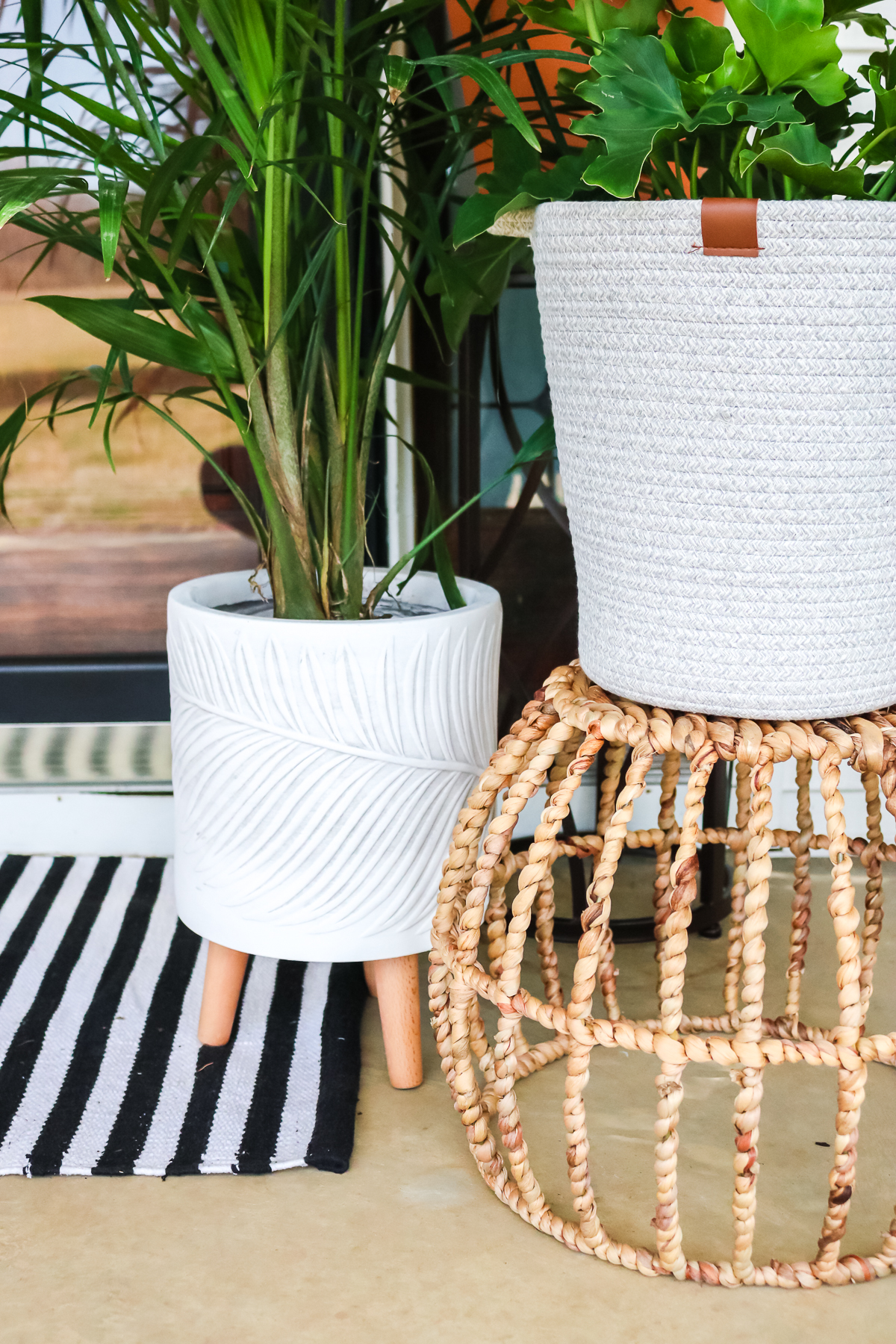 farmhouse style planters on a porch