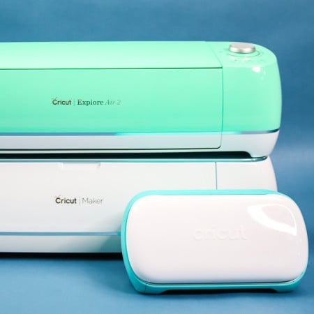 cricut machine types on a blue background