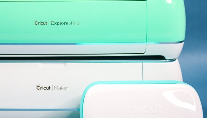 cricut machine types on a blue background