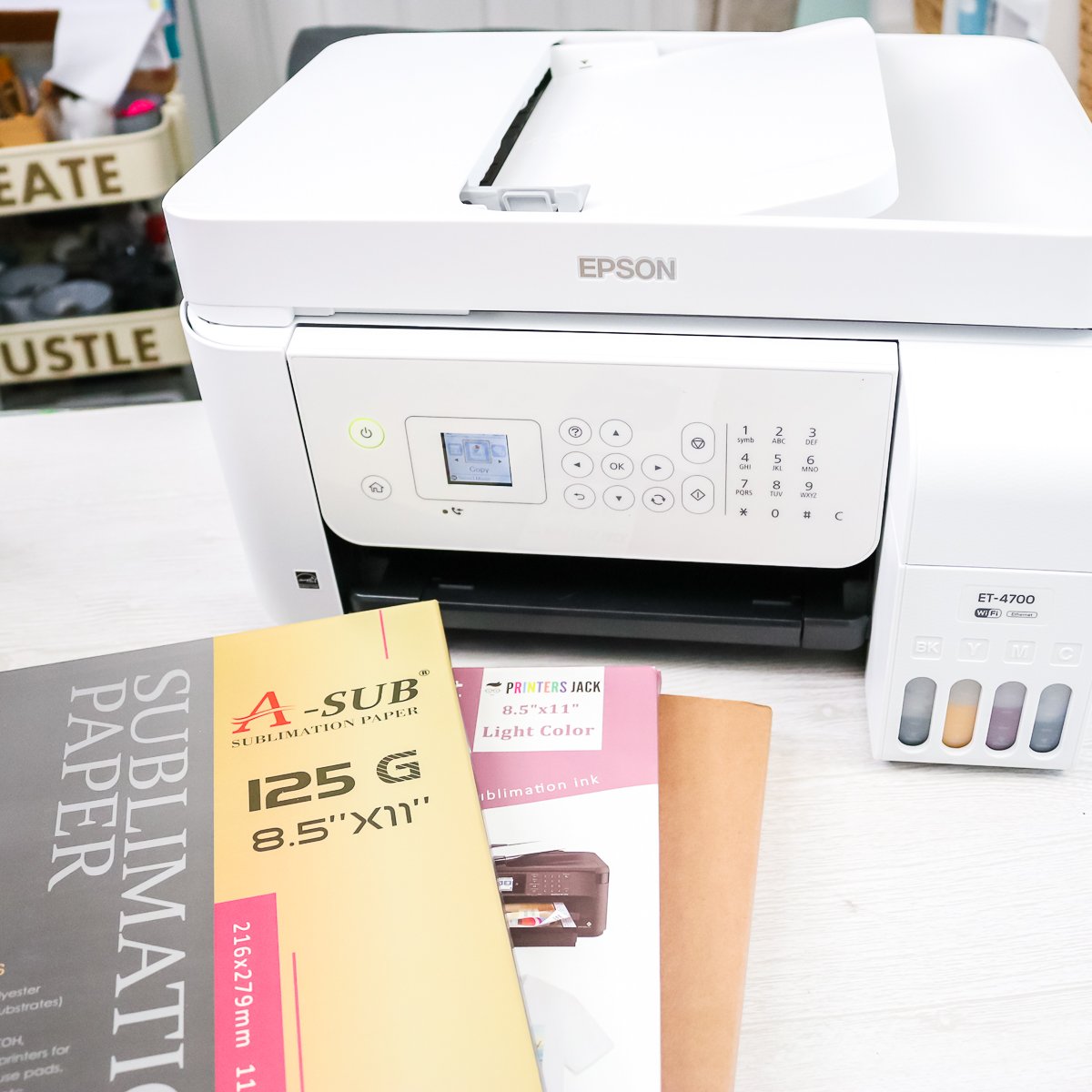 en utilisant divers papiers de sublimation pour comparer la qualité