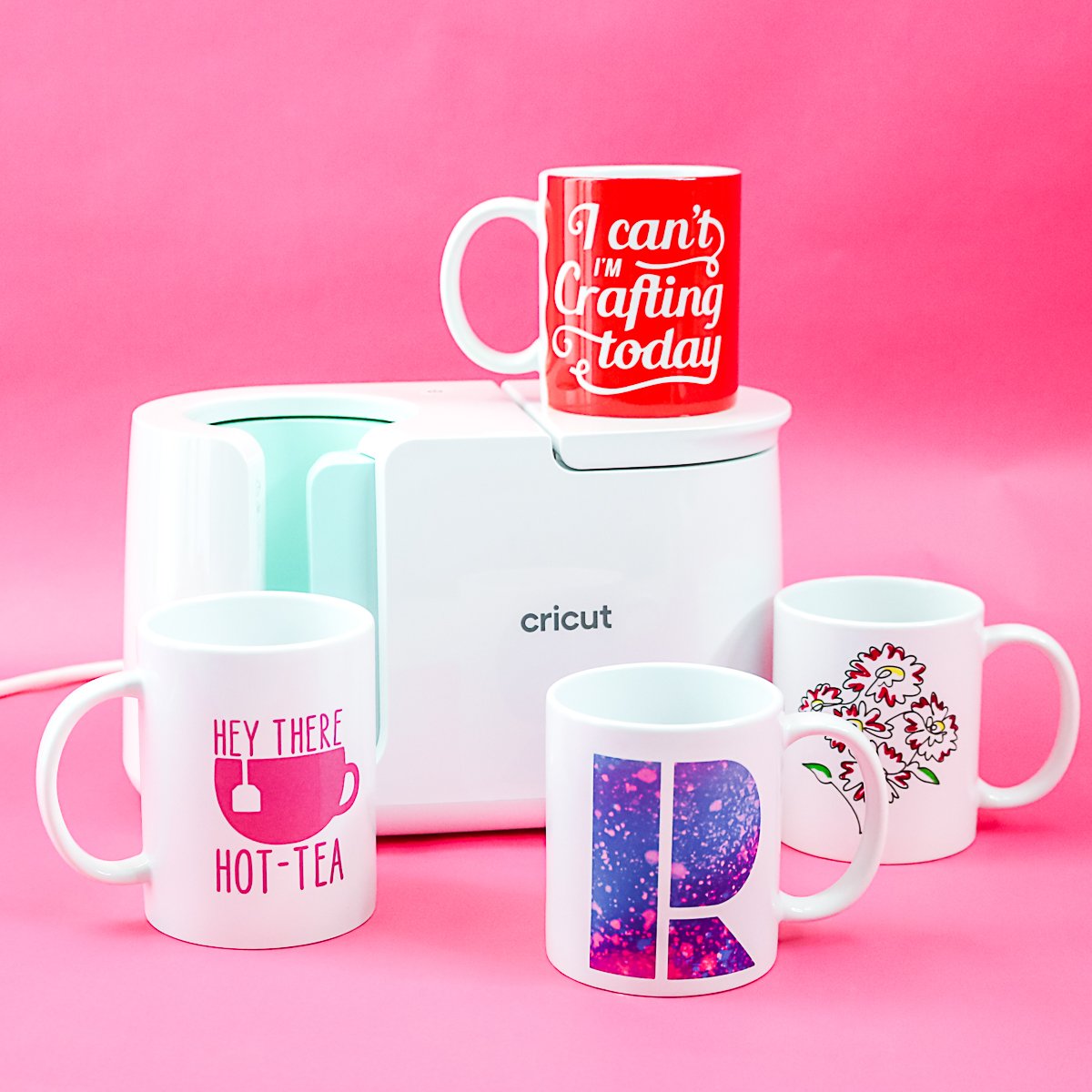 variety of mugs made with a cricut mug press