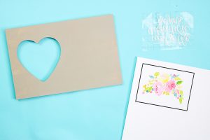 adding cricut vinyl to a picture frame