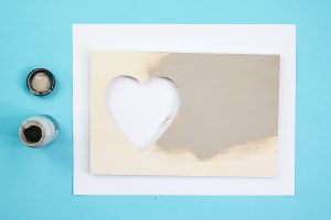 painting a heart cut out picture frame