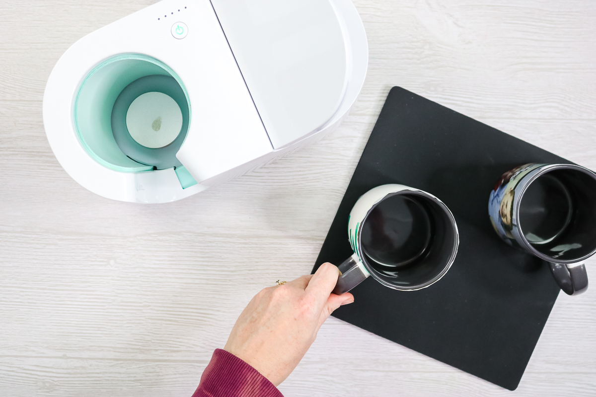 putting photo mug on a heat resistant mat