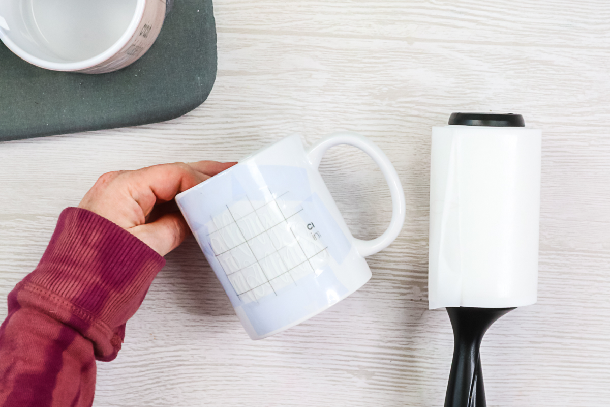 mug with design taped into place