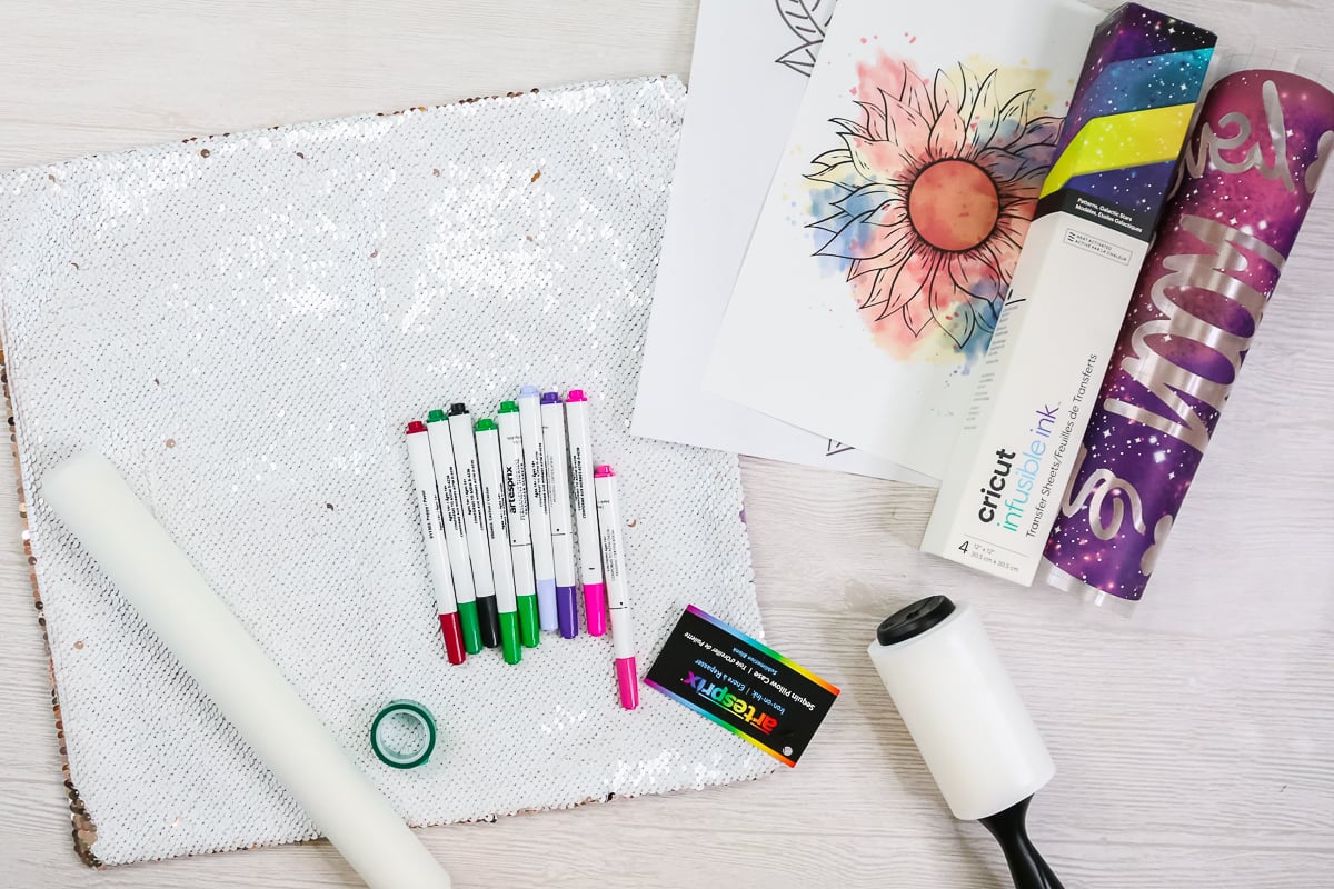 sequin pillow cover with supplies on a table