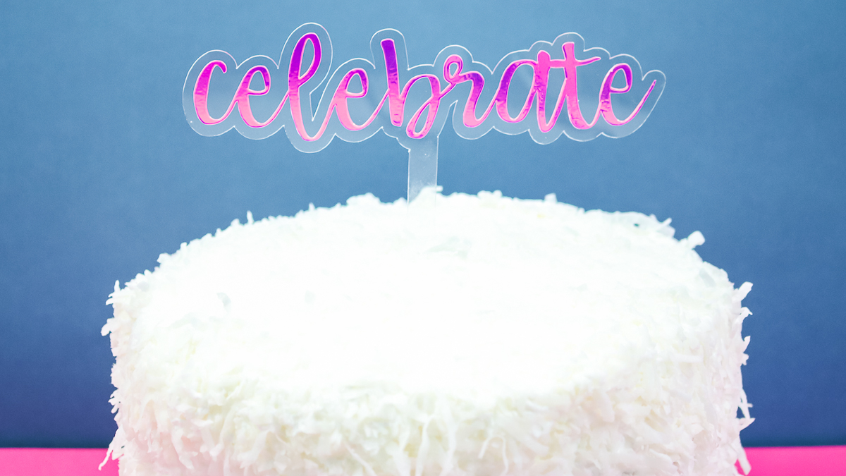 celebrate cake topper made on a cricut maker