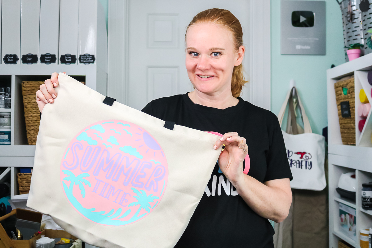 Angie holden with a tote bag