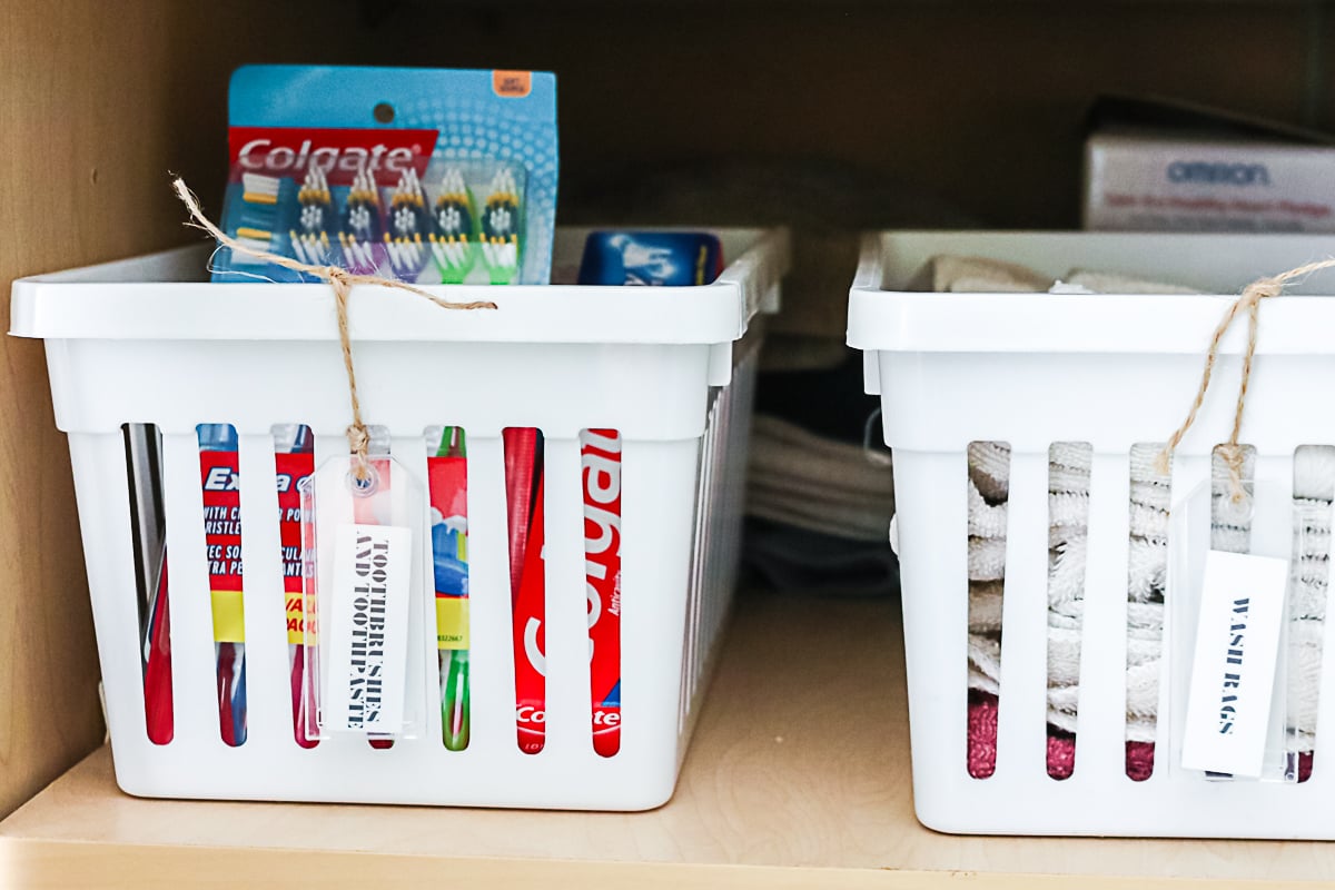 plastic hang tags with labels in a bathroom cabinet