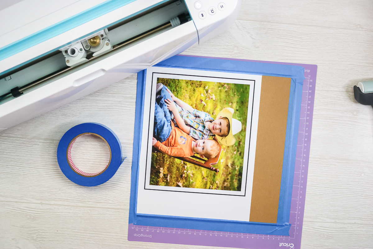 taping around chipboard on a cricut strong grip mat