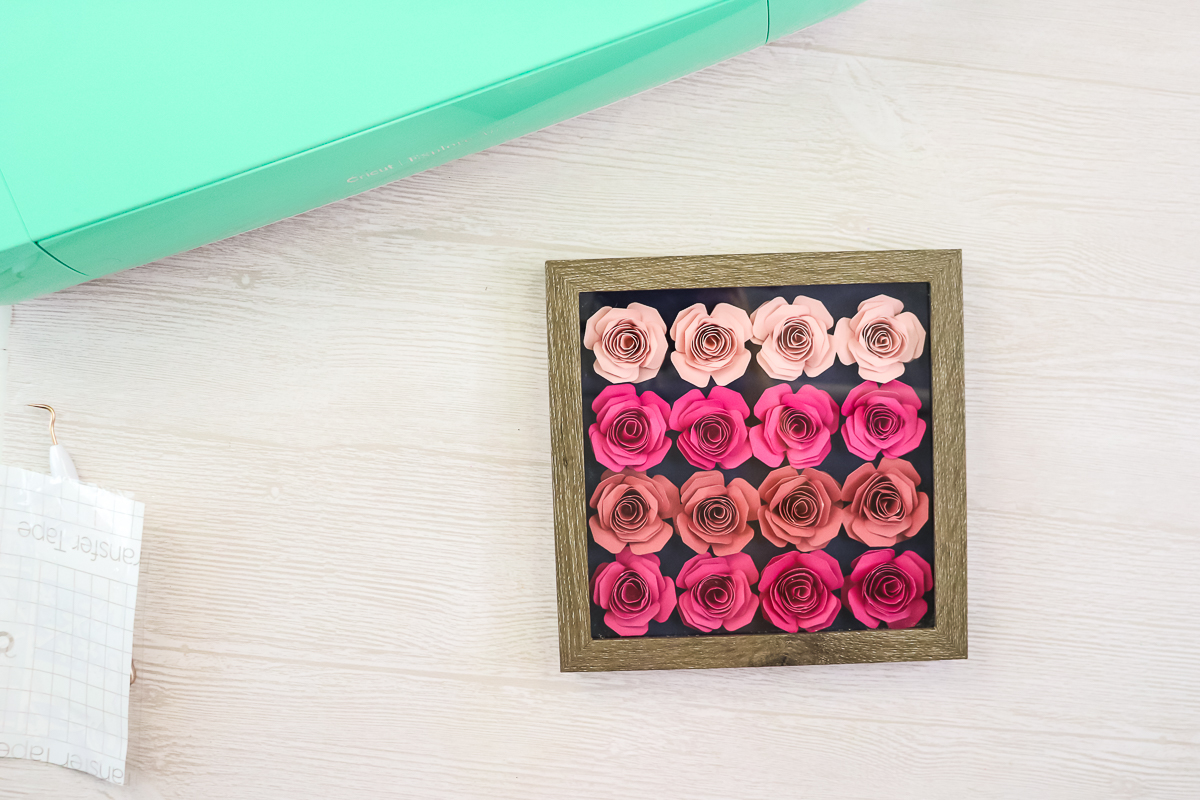 paper flowers in a shadowbox