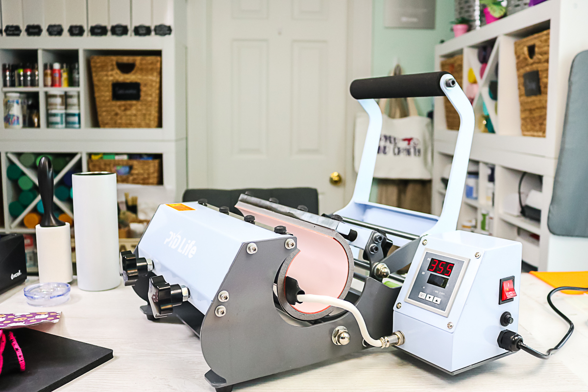 tumbler press on a table