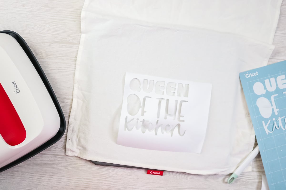 adding a freezer paper stencil to a tea towel