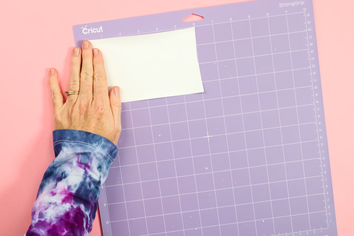 adding strong grip transfer tape to a strong grip mat